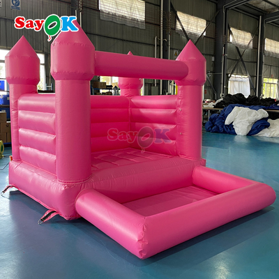 Sayok บูมเซอร์งานแต่งงานเป่าลมขนาดเล็ก PVC แบบกำหนดเอง บ้านกระโดดเป่าลมสีชมพูสำหรับงานปาร์ตี้กลางแจ้ง
