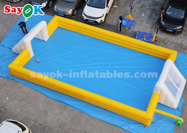 Giant Inflatable Football 12 * 6m สีเหลือง PVC เกมกีฬาทำให้พองสนามฟุตบอลทำให้พอง