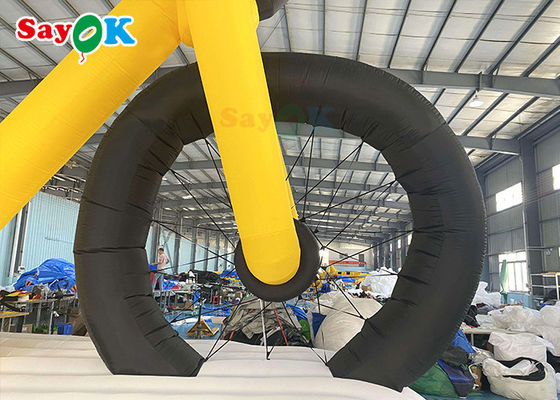 โฆษณาสีเหลืองผลิตภัณฑ์เป่าลมแบบกำหนดเองสูงรุ่นส่งเสริมการขายจักรยานพร้อมพิมพ์