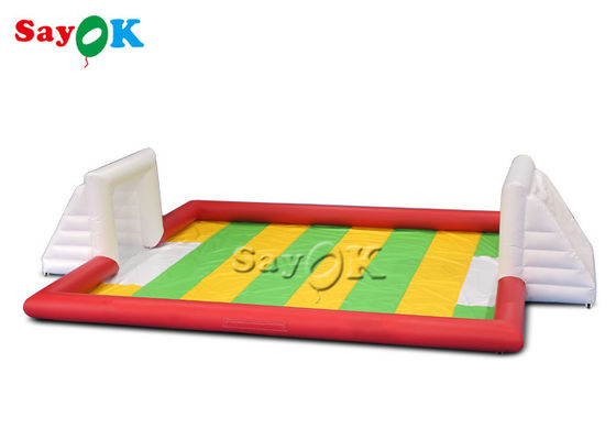 เกมปาร์ตี้ทำให้พอง 10x7m Red Pvc เกมกีฬาทำให้พอง Carnival Blow Up Soccer Field
